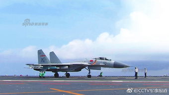 歼-15西太平洋雨中带弹驱离外机